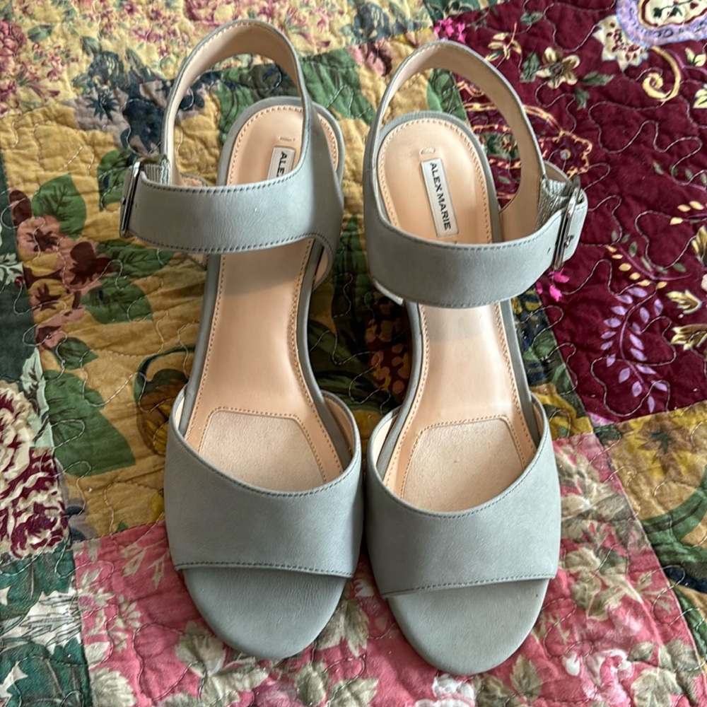 Woman’s pale blue leather wedge Alex Marie Sandals